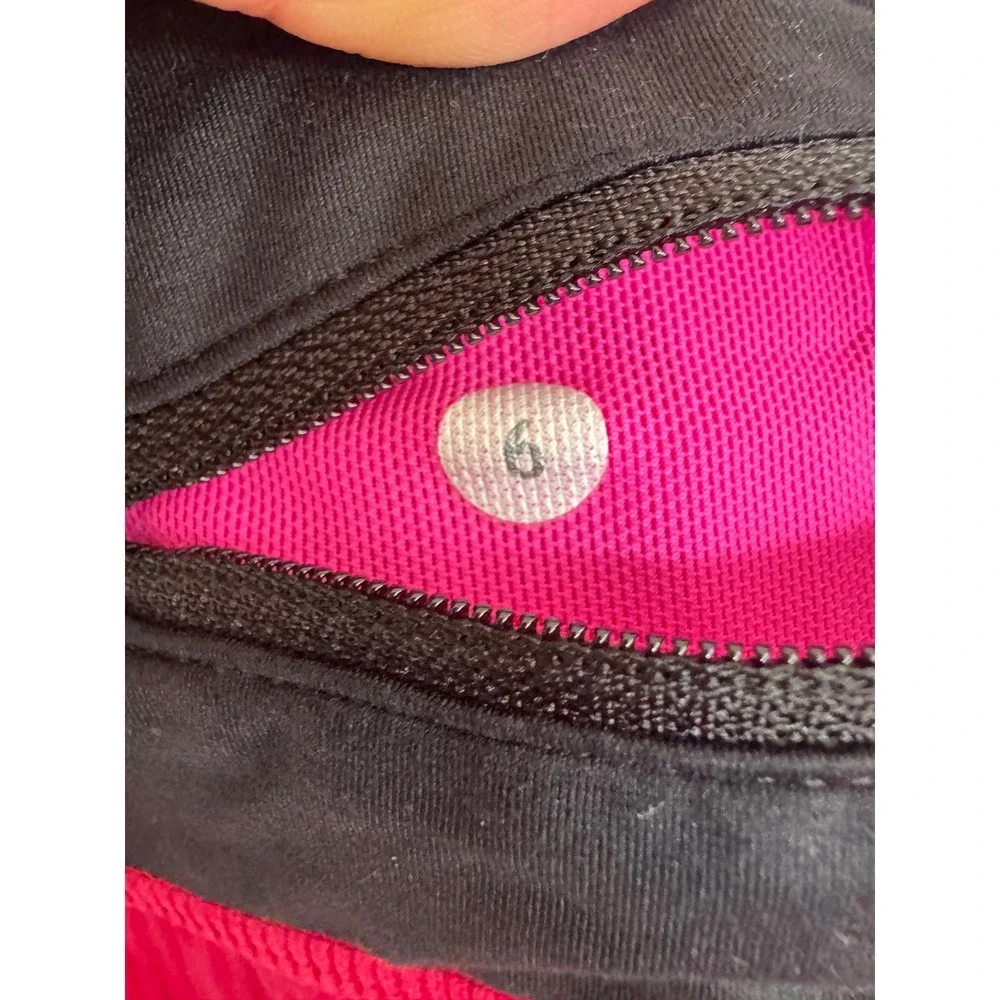 Lululemon pink & black shorts size 4.